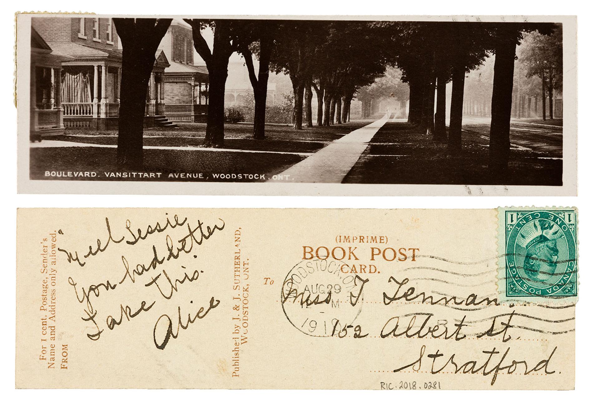 The view down the sidewalk of a picturesque treed street, with the message side of the postcard below