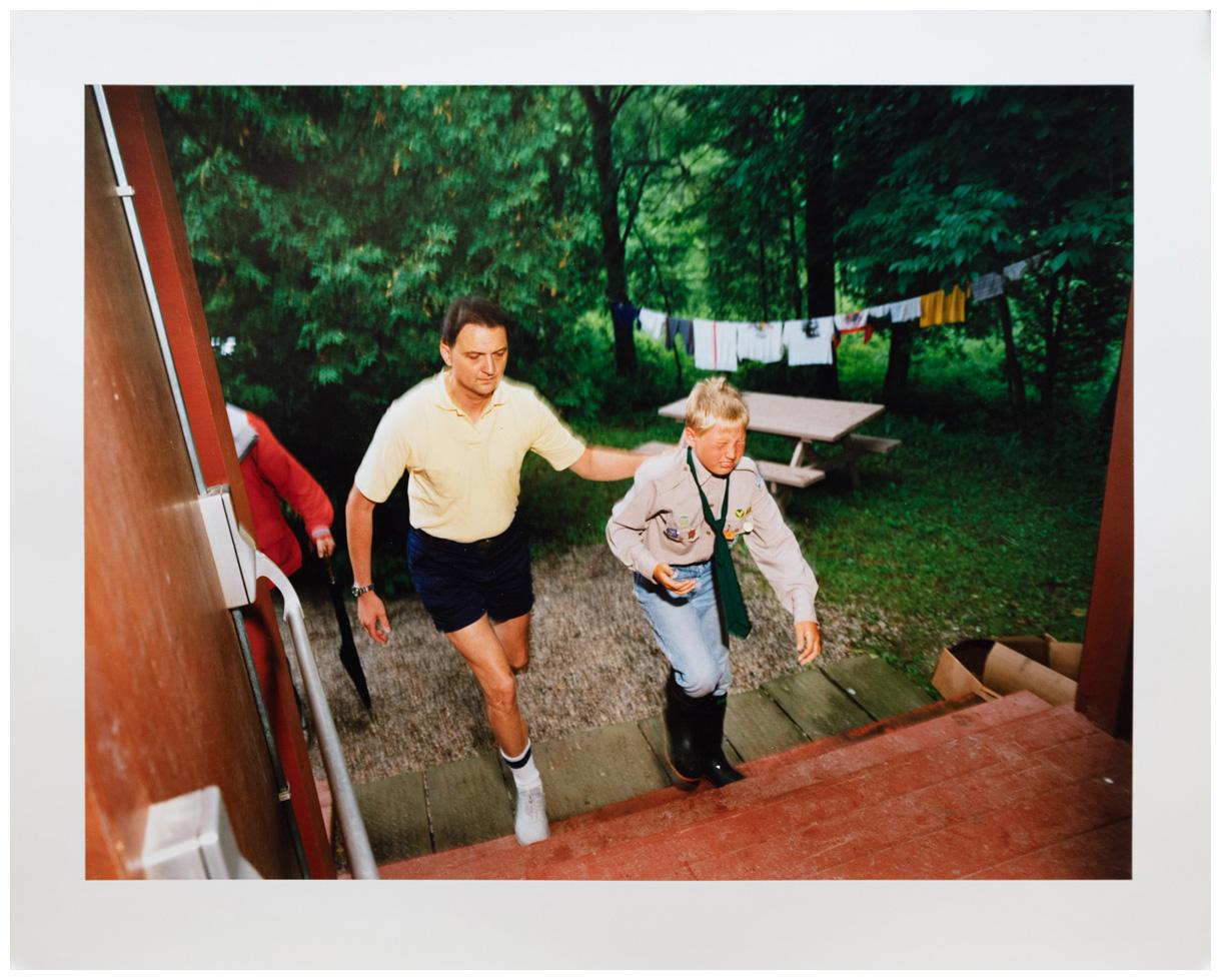 Photograph by Edward Burtynsky. A camper and counsellor at summer camp.