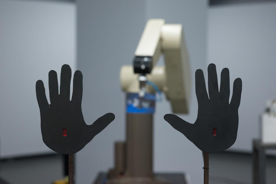 A pair of hand-shaped mechanical sensors