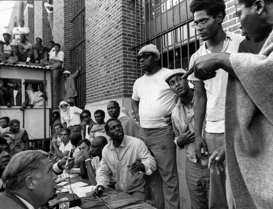 Group of black inmates negotiate with media and state prisons Commissioner Russell Oswald