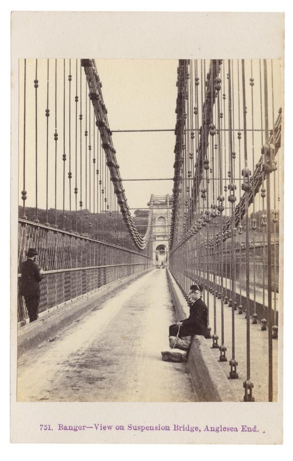 Two men shown on a long bridge. Photograph by Francis Bedford.