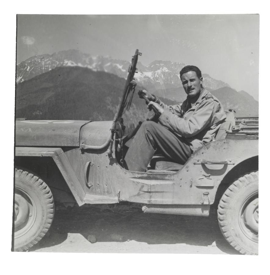 Portrait of a man in a military truck from World War Two.
