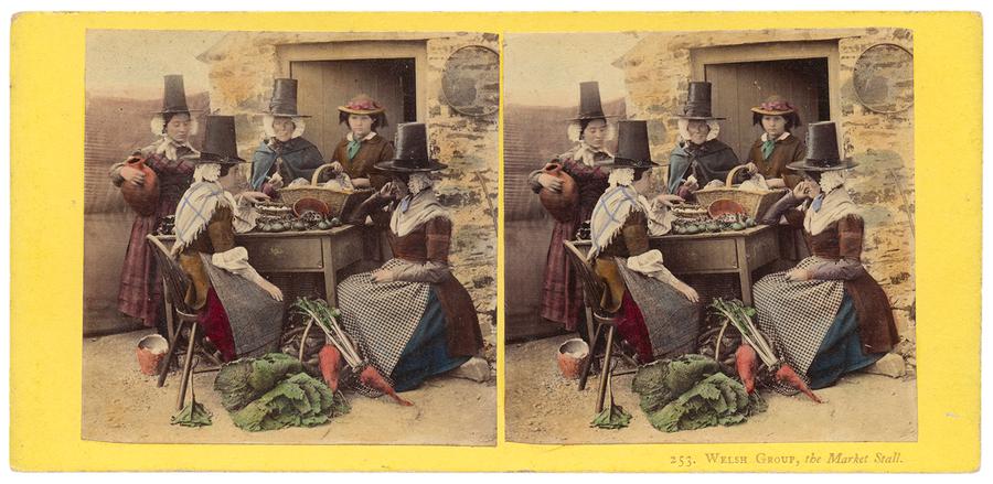 A stereograph of a group dressed in traditional Welsh clothes.