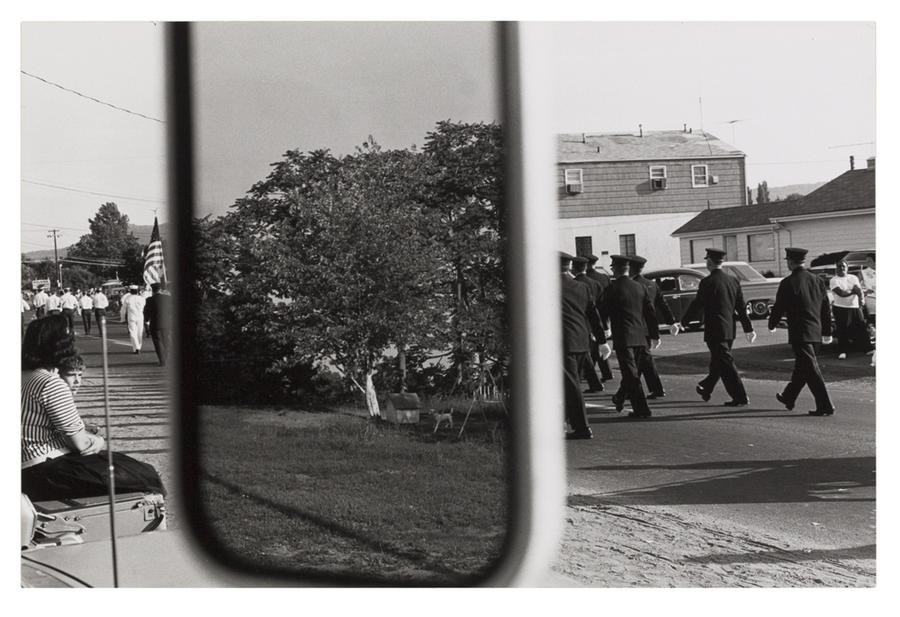 Photo of marching men taken through car mirror in Stony Point, New York in 1966.
