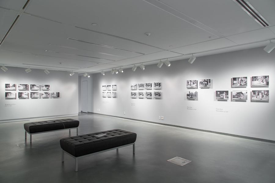 A gallery with photos on the wall