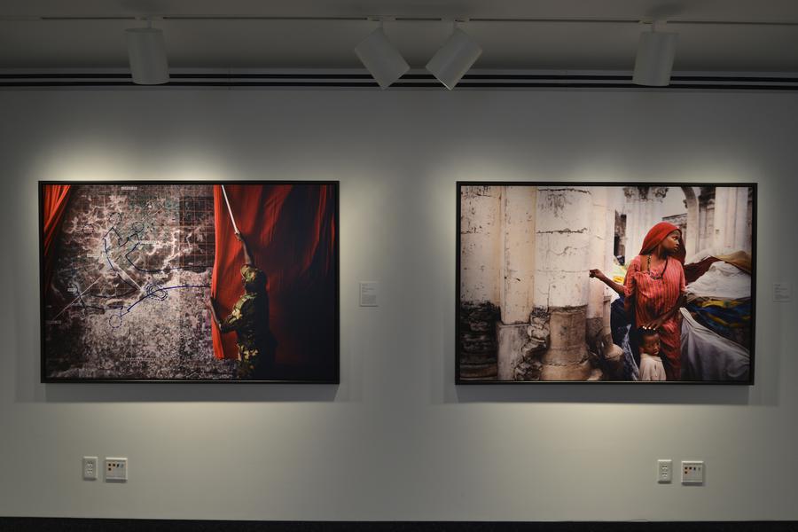 Two large photographs of a woman in a red dress